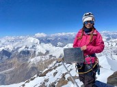 Bid to rescue woman stuck 22,000ft up mountain called off after man dies trying to save her