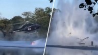 Watch firefighting helicopter crash into pond in France