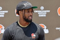 Browns cornerback Denzel Ward leaves practice; defensive tackle Mike Hall Jr. works to the side