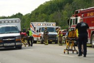 Tour bus rollover kills 5 on interstate highway in western New York