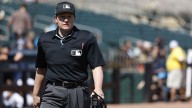 MLB’s 1st female umpire expands history in behind