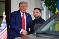 The Latest: Zelenskyy signals openness to three-way meeting with Trump and Putin