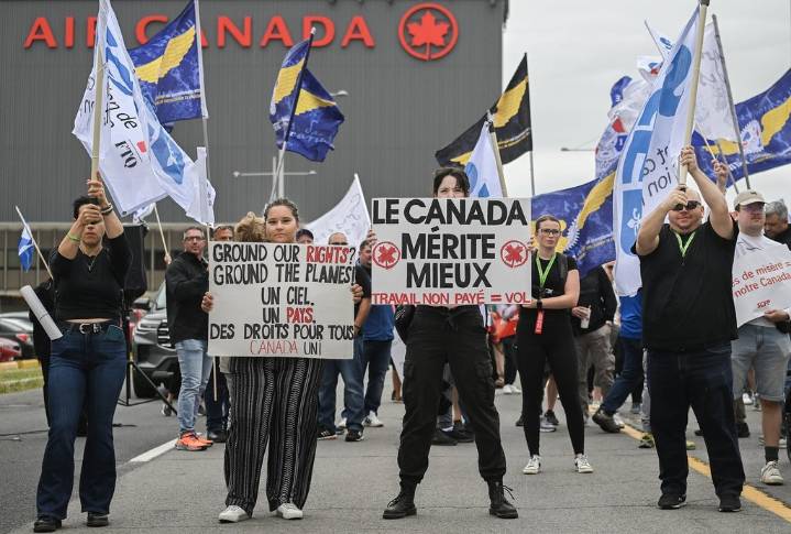 Air Canada passengers still scrambling to rebook as labour dispute grounds flights