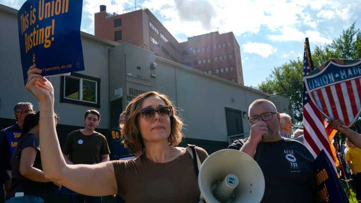 Organizers speak at 'Save Our VA' rally in Iowa City