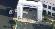 Woman fires at co-workers in O.C., then dies in police shooting in L.A.