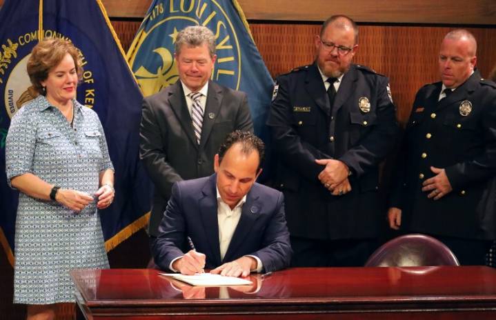 Louisville mayor signs new penalties for copper wire theft into law