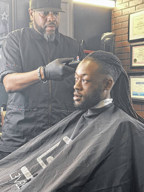 SamCo. barber reflects on 20 years of “Public” service