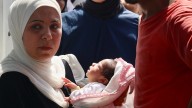 Israeli Gaza attacks kill 123 in 24 hours as three children die of hunger