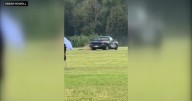 Pickup truck drives onto New Jersey football field during practice; driver arrested, police say