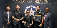 Officers honored by US Marshals Service for capturing quadruple murder suspect Austin Drummond