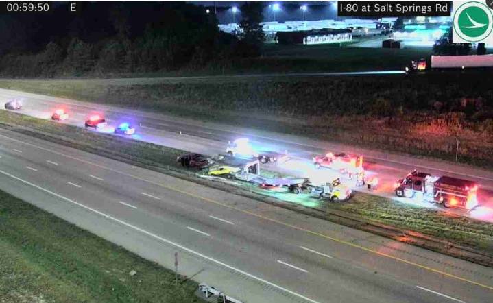 Truck hauling car crashes on I-80 in Weathersfield
