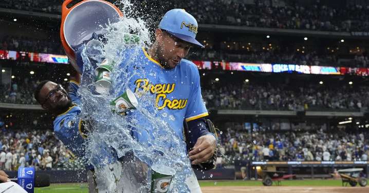 Brewers win 7th straight thanks to Perkins' throw