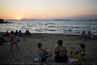 Beach on a budget: Greeks settle for day trips, priced out of iconic destinations