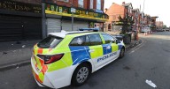 Woman arrested after man stabbed outside Manchester shop