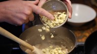 Savory oatmeal breakfast trend swaps sweet toppings for eggs, cheese and chili