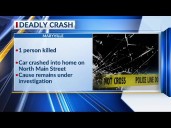 One dead after car crashes into home in Marysville