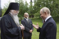 Archbishop rebuked for meeting Putin