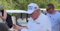 Bystander Flips Off Trump as He Heads to Golf Club