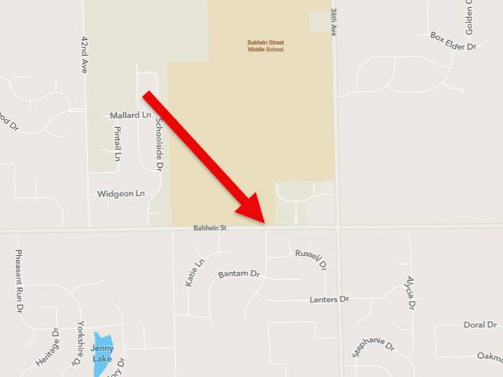 New traffic signal coming to busy intersection by Hudsonville Public Schools