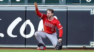Angels' Taylor Ward carted off after crashing into scoreboard