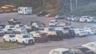 Video shows suspect running over officer, shots fired by police in North Kingstown