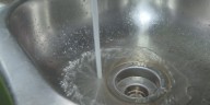 Officials say the water crisis in Apalachicola is settling down, but residents disagree