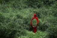 24 Surreal Self-Portraits Wearing Full-Body Suits That Suggest Strangeness, Otherworldliness, And Isolation