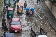 Pakistani villagers scared to go home after deadly floods, with warnings of more rain to come