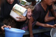 Palestinians searching for food killed by Israeli strikes after famine in Gaza declared