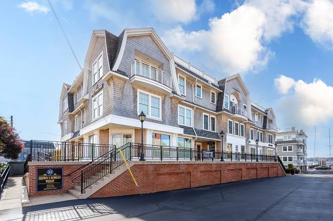 Newport residential condo overlooking water sells for $3.08M