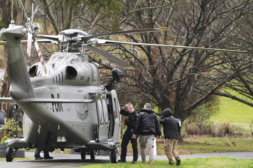 Australian police identify suspect in fatal shooting of officers as manhunt enters second day
