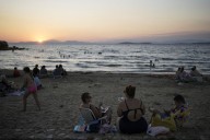 Beach on a budget: Greeks settle for day trips, priced out of iconic destinations