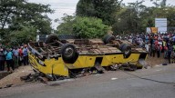 A bus carrying mourners from a funeral overturns in Kenya, killing 25 people