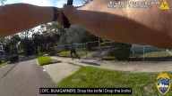 A man holding a knife pointed it and told a JSO officer to ‘back up.’ The officer shot him as he ran away, video shows