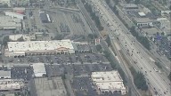 A man running from an immigration raid died after entering a California freeway, officials say
