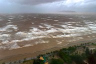 Typhoon Kajiki kills 3 in Vietnam, floods Hanoi streets
