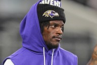 Ravens’ Harbaugh says there’s ‘no damage’ to Lamar Jackson’s foot after it was stepped on