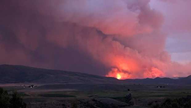 Colorado prison evacuated as growing wildfire becomes one of the largest in state history