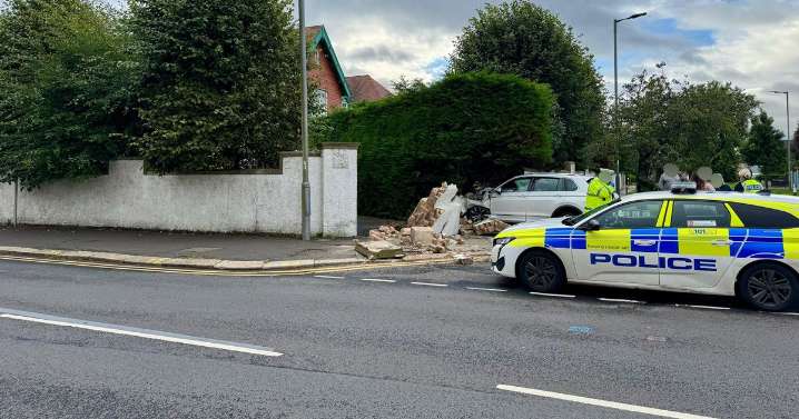 Ayrshire road closed after car hits garden wall