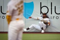 Tatis makes spectacular leaping catch to rob Devers of a home run