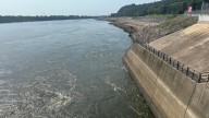 Crews working to repair spillway gate stuck open at dam on Arkansas River