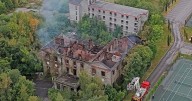 Girl, 14, arrested on suspicion of arson following blaze at historic house