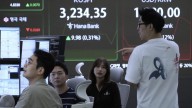 Asian shares are mixed after days of gains driven by hopes for US rate cuts