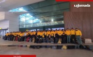 Regresa a México primer contingente de bomberos enviado a combatir incendios en Canadá