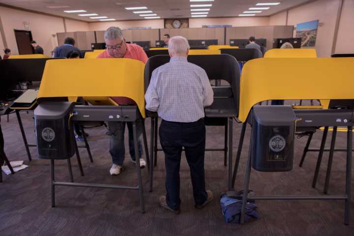 Tech firm overbilled County on voting machines to bribe elected officials, feds say