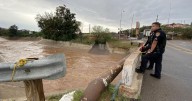 Authorities search for person swept by floodwaters