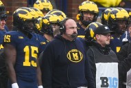 Michigan coach fired during sign-stealing probe has name cleared by NCAA