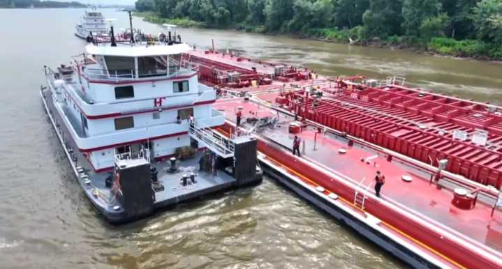 2 dead after helicopter crashes into Mississippi River barge north of St. Louis
