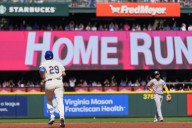 Cal Raleigh hits his 48th, 49th homers to set MLB season mark for catchers, passing Salvador Perez