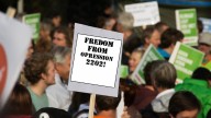 Mennonite Writer Starts Lucrative New Business Proofreading Protest Signs